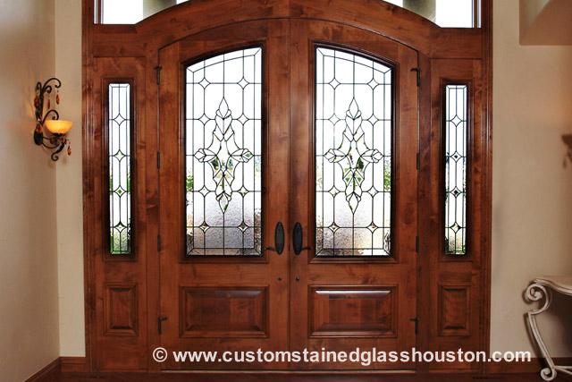 beautiful entryway with stained glass in a home in houston texas