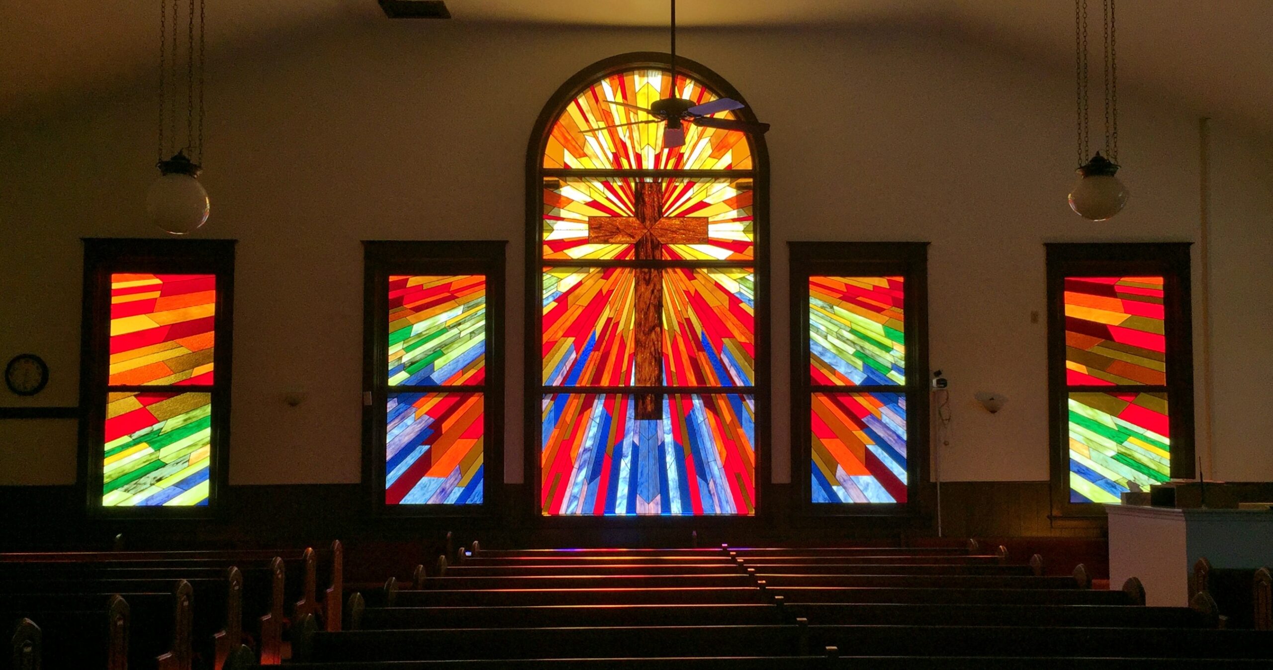 Houston church with broken stained glass and weak frames